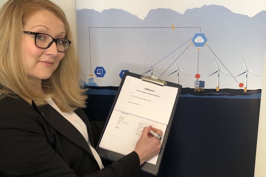 Maggie McMillan signing MoU to bring Miros sensors to the Chinese offshore wind market